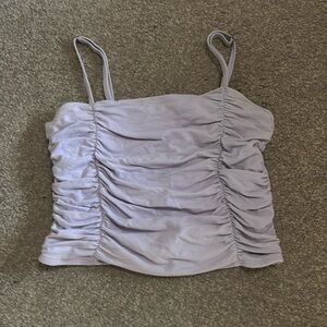 purple ruffled tank